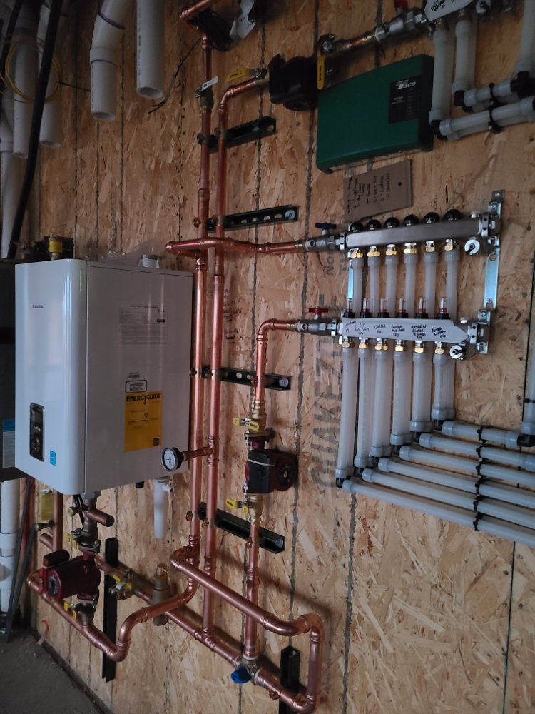 Mechanical room for a radiant in-floor heat job in a custom home for Mark D Person Homes.